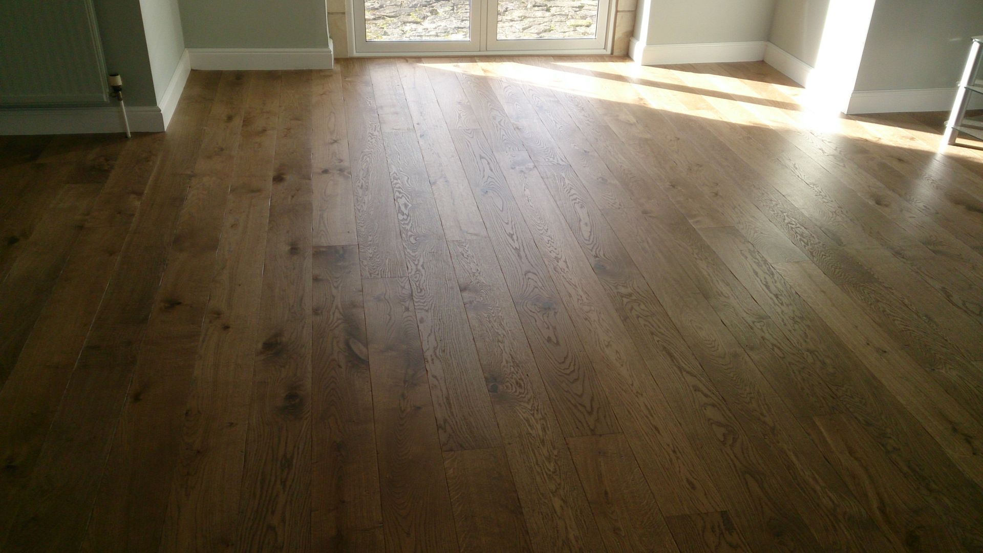 Supply and fit engineered oak flooring